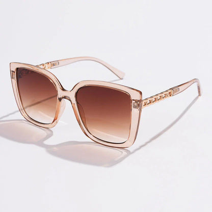 Luxury oversized square sunglasses for women with a sturdy alloy frame and gradient, mirrored lenses that offer UV protection and reduce glare.