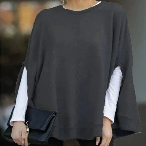 Cozy and stylish bat sleeve knit top poncho in a variety of sizes for everyday wear
