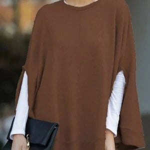Cozy and stylish bat sleeve knit top poncho in a variety of sizes for everyday wear