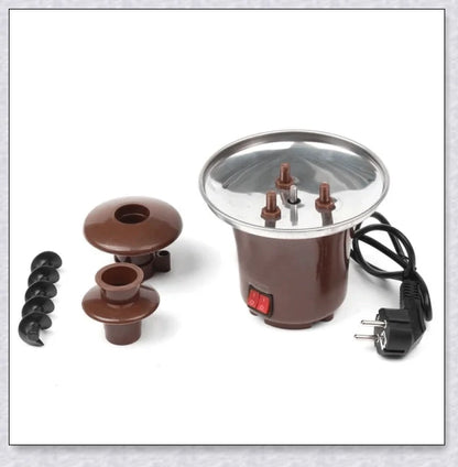 3-tier chocolate fondue fountain cascading with rich, melted chocolate, perfect for dipping fruits, marshmallows, cookies, and more