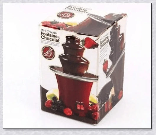 3-tier chocolate fondue fountain cascading with rich, melted chocolate, perfect for dipping fruits, marshmallows, cookies, and more