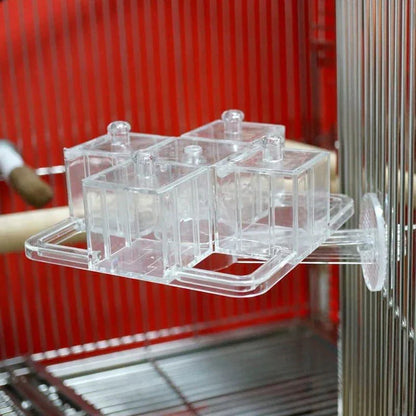 Trendha Foraging Carousel for Parrots - A durable polycarbonate carousel with multiple compartments to challenge your parrot's problem-solving skills and natural foraging instincts.