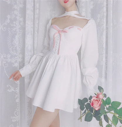 A beautiful white dress with a micro-bubble shoulder line, voluminous lantern sleeves, and a fluffy ballet skirt, perfect for adding a touch of French vintage elegance to your wardrobe.