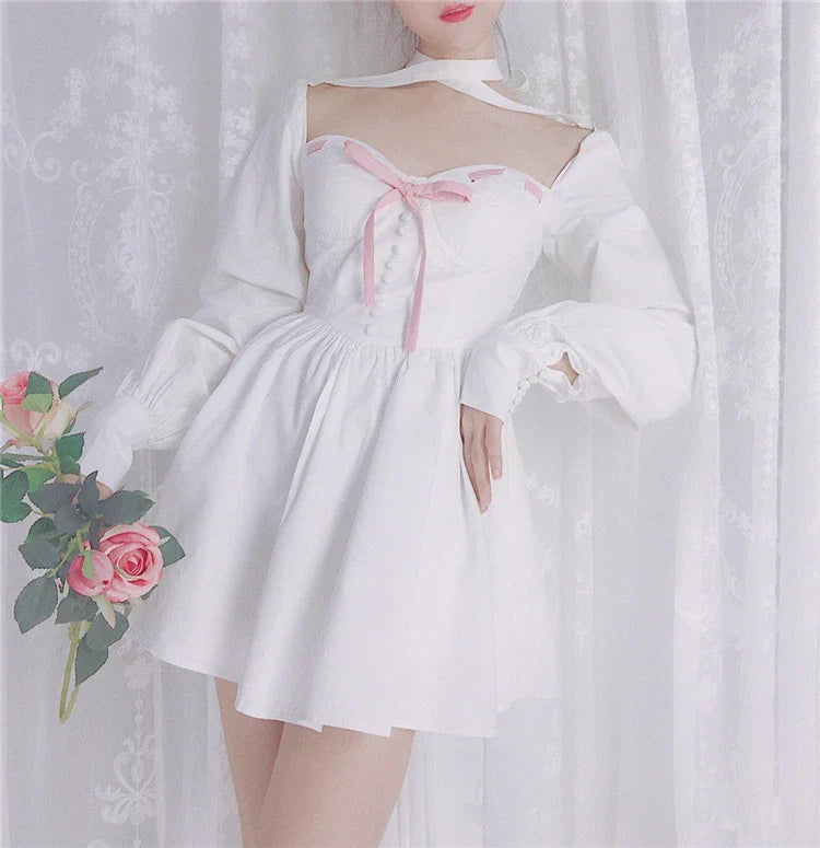 A beautiful white dress with a micro-bubble shoulder line, voluminous lantern sleeves, and a fluffy ballet skirt, perfect for adding a touch of French vintage elegance to your wardrobe.