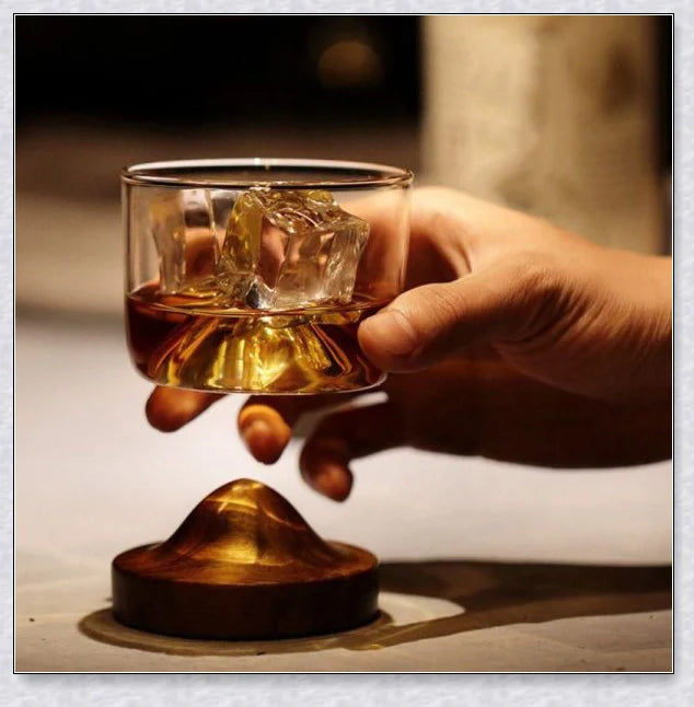 Wooden Mountain Whiskey Glass with a charming mountain silhouette design and natural wooden tray
