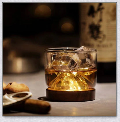 Wooden Mountain Whiskey Glass with a charming mountain silhouette design and natural wooden tray