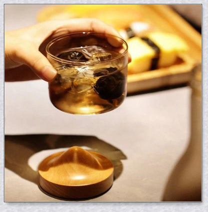 Wooden Mountain Whiskey Glass with a charming mountain silhouette design and natural wooden tray
