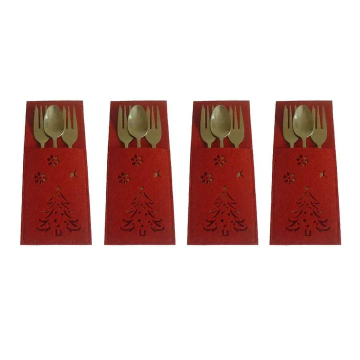 Festive cloth cutlery bags in a holiday pattern, used to neatly organize and serve silverware at a Christmas dinner table