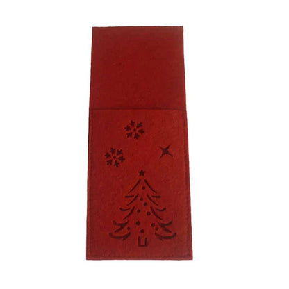 Festive cloth cutlery bags in a holiday pattern, used to neatly organize and serve silverware at a Christmas dinner table