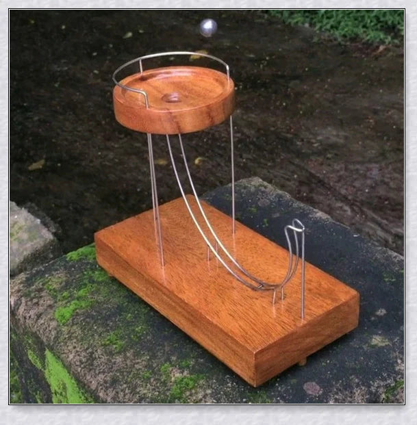 Perpetual Motion Marble Machine - Mesmerizing desk toy that keeps a ball looping endlessly, defying gravity and captivating onlookers