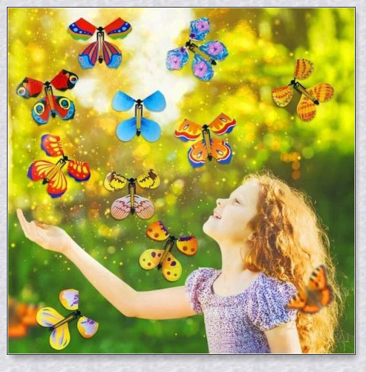 A group of colorful magic flying butterflies released from a greeting card or book, creating a whimsical and enchanting surprise