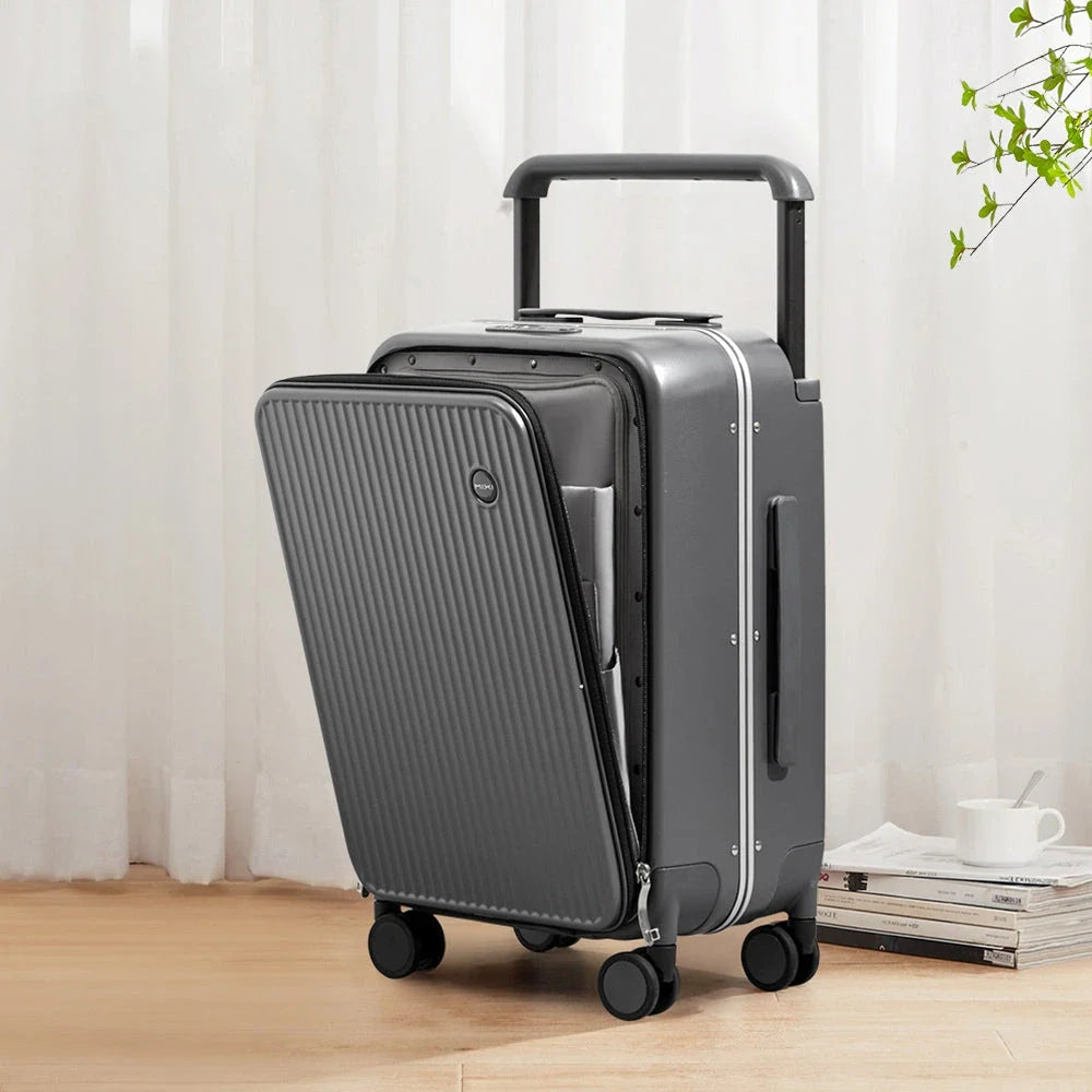 Luxury wide handle polycarbonate suitcase with front laptop pocket, available in red color and two size options.