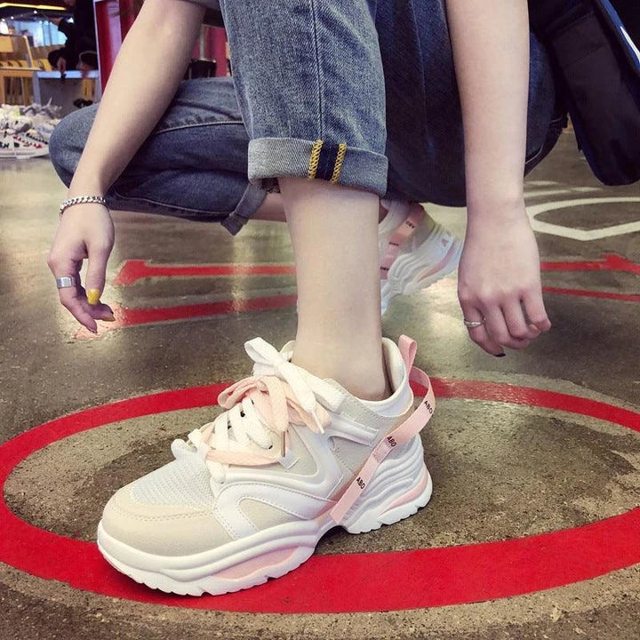 Trendy mesh couple shoes with a breathable design, flexible rubber sole, and stylish color-matching pattern