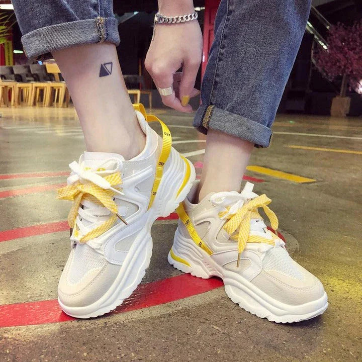 Trendy mesh couple shoes with a breathable design, flexible rubber sole, and stylish color-matching pattern