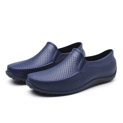 Men's Simple Casual PVC Short Rain Boots in black, with a flat, non-slip sole and round toe shape for comfortable, waterproof protection.