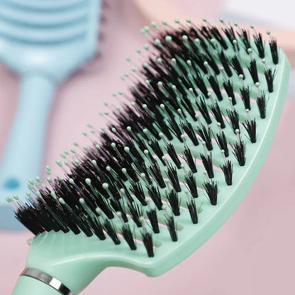 Women's Wet Curly Detangling Hair Brush with ergonomic design and flexible bristles for effortless styling and detangling of curly hair