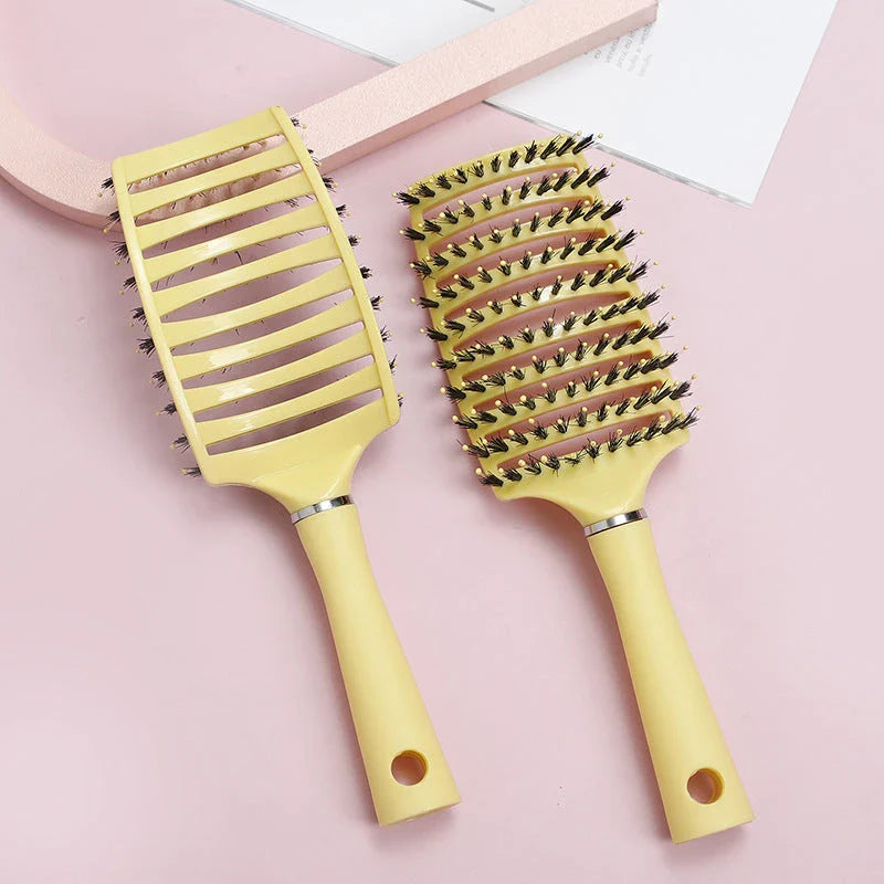 Women's Wet Curly Detangling Hair Brush with ergonomic design and flexible bristles for effortless styling and detangling of curly hair