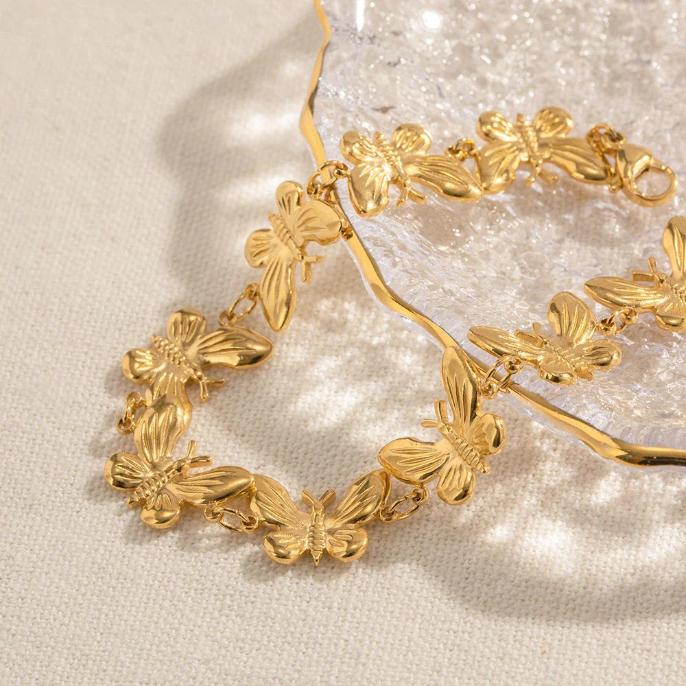 18K gold plated stainless steel bracelet with delicate butterfly pattern and fine polishing