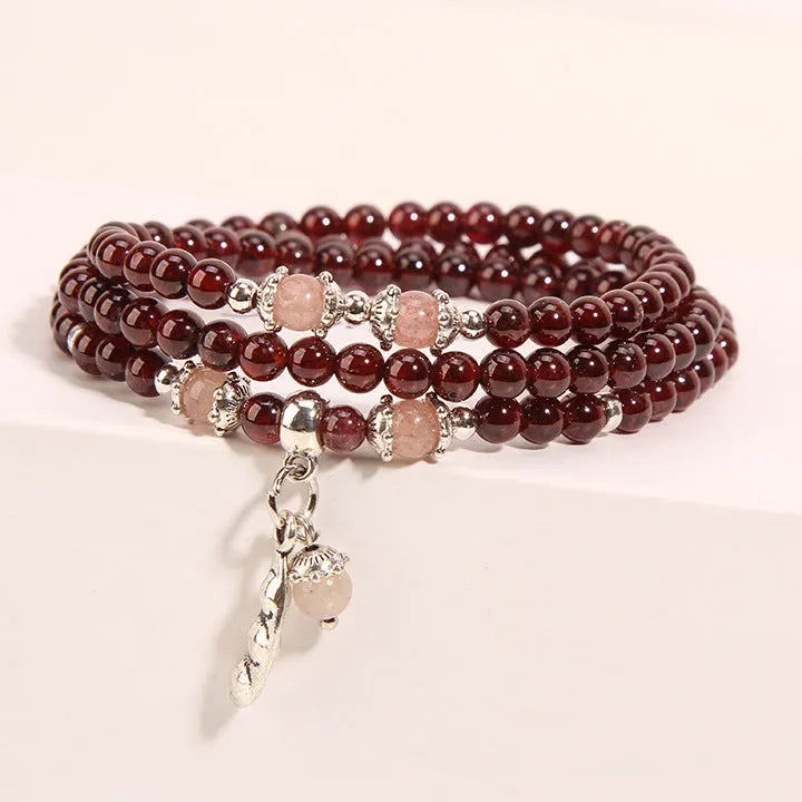 Wine red garnet crystal floral bracelet with Bohemian and ethnic design elements