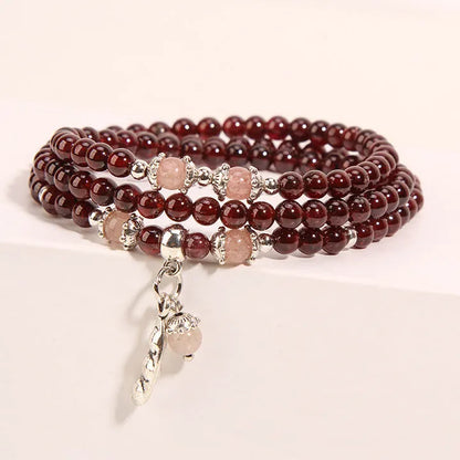 Wine red garnet crystal floral bracelet with Bohemian and ethnic design elements