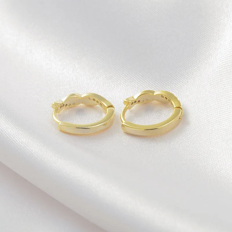 Gold geometric interwoven earrings with 1.5cm diameter hemp rope pattern and diamond-treated copper surface