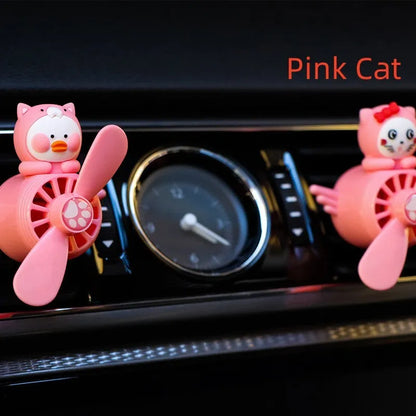 Set of four animal-themed car air vent clip ornaments: black husky, black cat, pink cat, and pink duck.