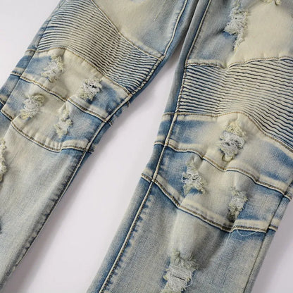 Light blue men's distressed slim jeans with hand-frayed detailing and straight leg cut