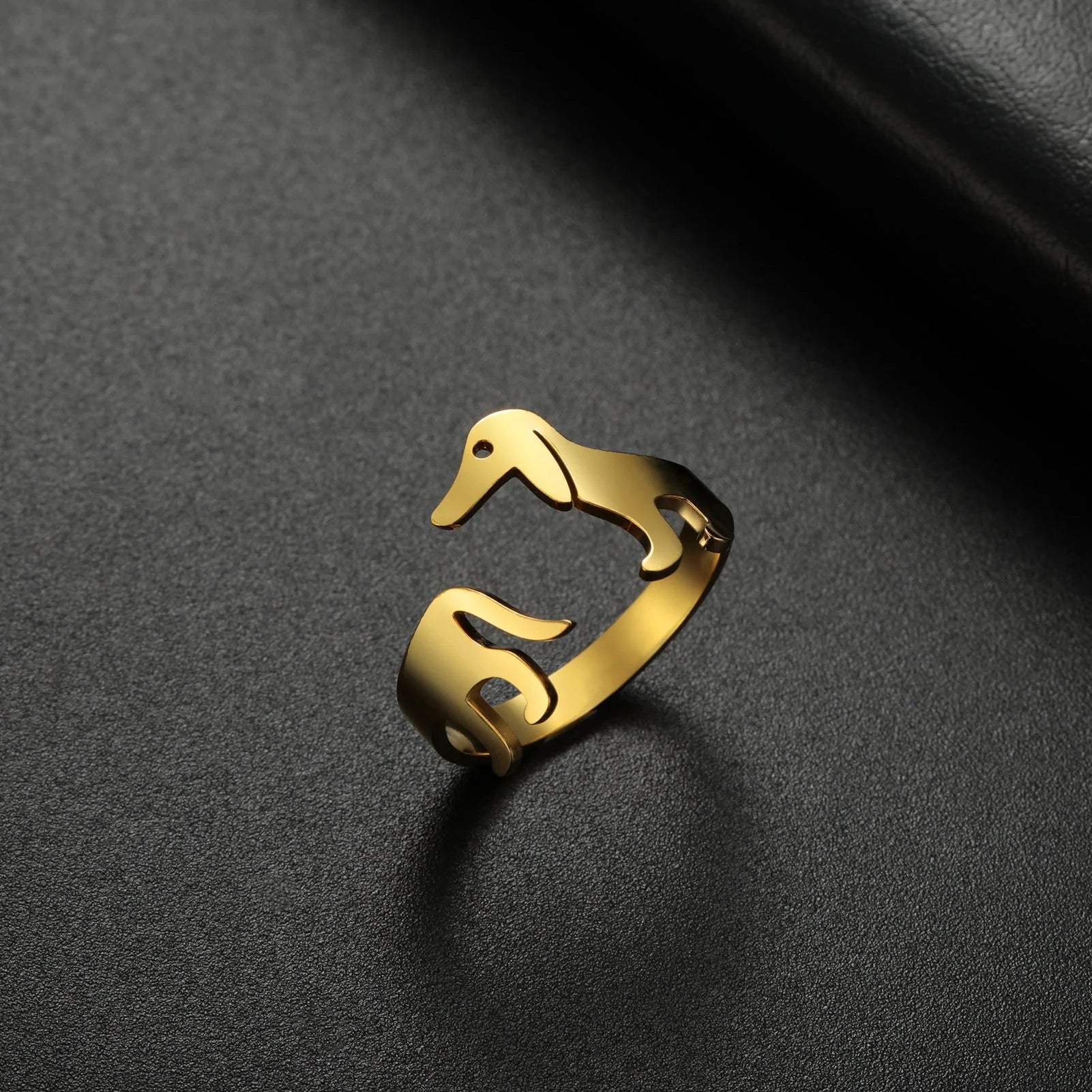 Adjustable Titanium Steel Sausage Dog Ring, a unique fashion accessory with a playful dog-inspired design made of premium materials