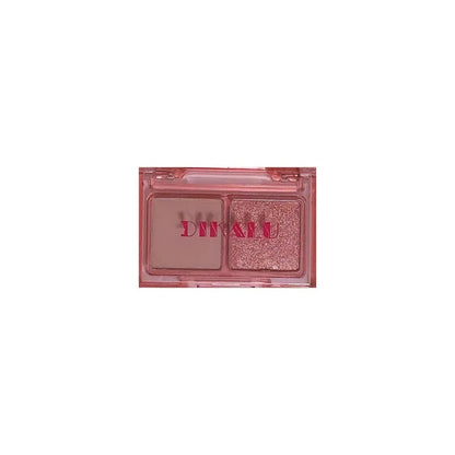 DIKALU two-colour eye shadow compact open, showing a matte and a shimmer shade split down the middle.