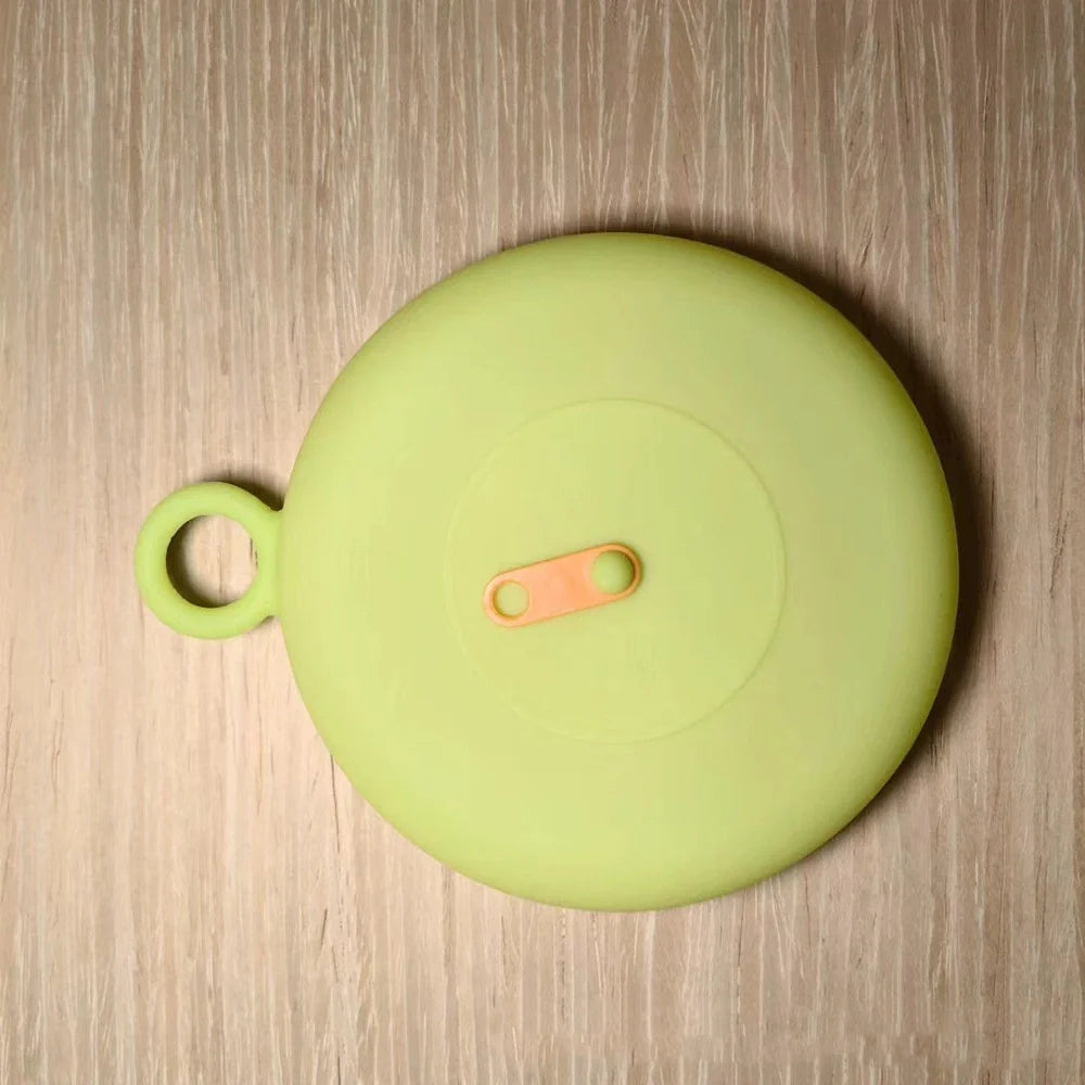 Three silicone freshness lids in beige, green, yellow colours showing 18cm, 10cm, 6.5cm diameters