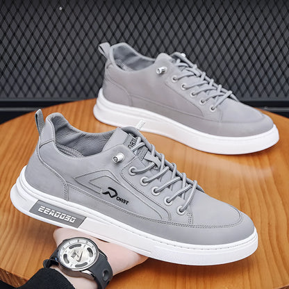 Grey men's low-top canvas casual trainers with lace-up front and round toe