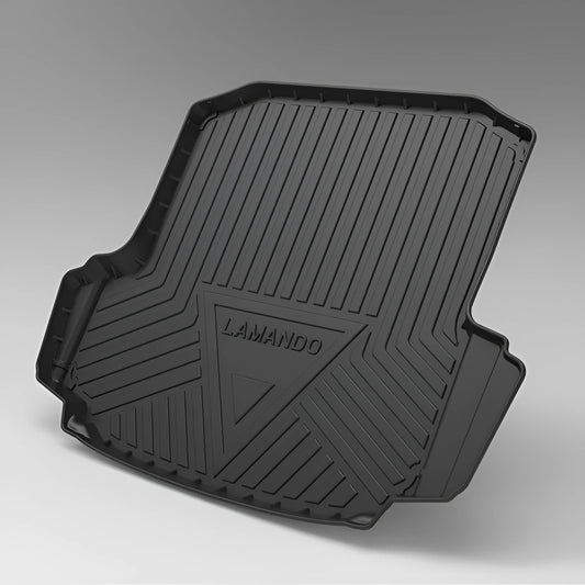 Black carbon fibre pattern TPE boot liner moulded to fit a car luggage bay, showing textured anti-slip surface.