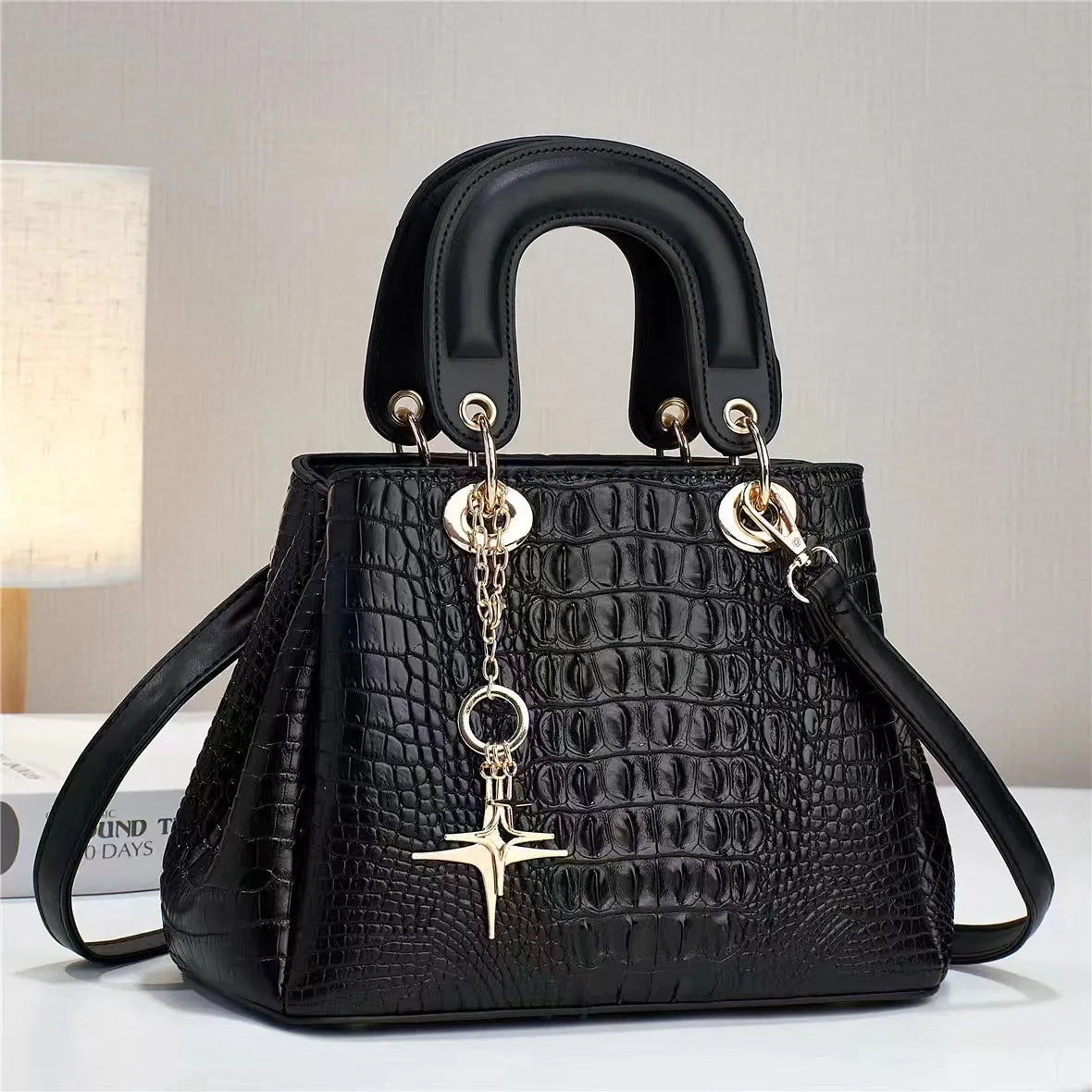Women's PU shoulder bag with single strap, horizontal square shape, embossed finish and zip change pocket in beige