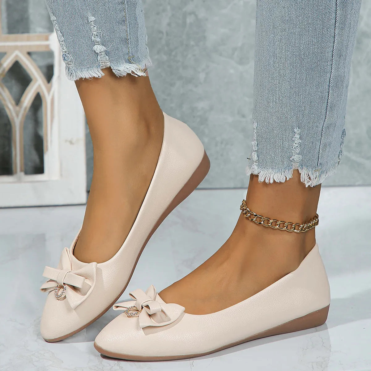 Women's beige flat casual slip-on shoes with bowknot detail and shallow mouth design