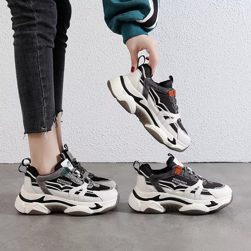 Thick-soled casual sports shoes in green and orange with leather and mesh upper