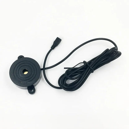 4-probe buzzer reversing radar kit with sensors, control module, and hole saw.