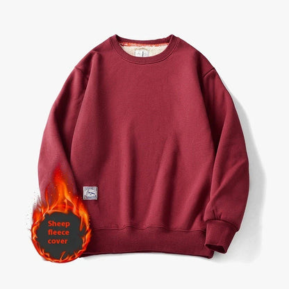 Cozy fleece pullover in a variety of classic colors, featuring a warm and soft fabric blend, stylish round neck design, and comfortable long sleeves.