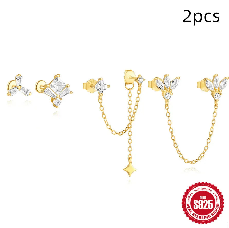 S925 sterling silver zircon stud earrings with a delicate 1.5cm gold-tone chain drop, shown in clover design.