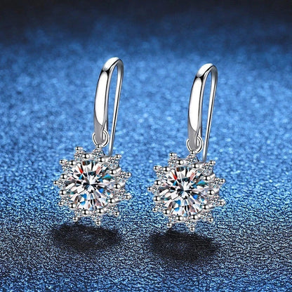 Elegant sunflower-inspired ear cuffs with a gleaming white gold finish, offering affordable luxury and sophisticated style.