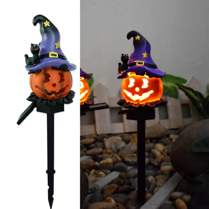 Solar-powered Halloween pumpkin lanterns lighting up a garden at night