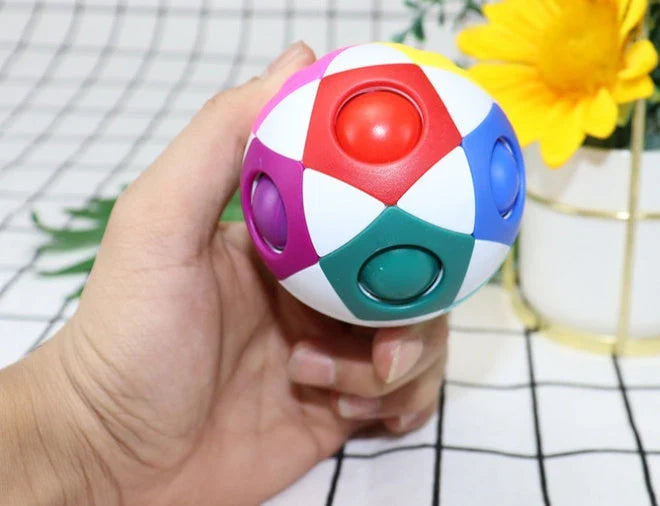 Colorful stress-relieving soccer ball puzzle with 12 holes, designed to engage children's cognitive skills and provide entertainment