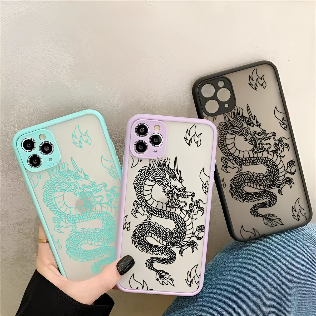 Frosted iPhone case with dragon line art in black, showing Chinese-style painted design and TPU PC back cover.