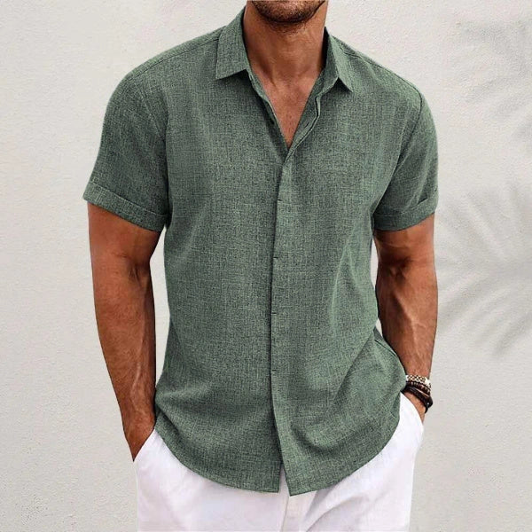 A versatile linen shirt in various colors, featuring a standing collar and short sleeves for a modern, tailored look.