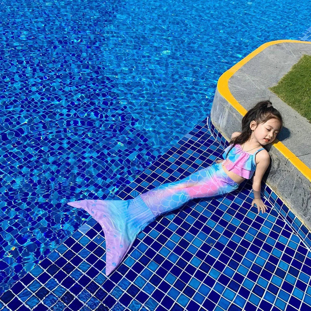 Children's swimsuit set with bikini top and fish tail skirt in pink colours