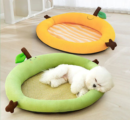 Green fruit-shaped backrest pet cooling mat for a dog, showing nest design and size scale.
