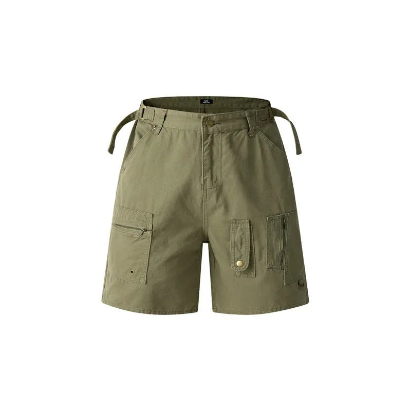 Retro loose-fit washed cotton workwear shorts in camouflage green colour with zip fly.