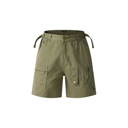 Retro loose-fit washed cotton workwear shorts in camouflage green colour with zip fly.