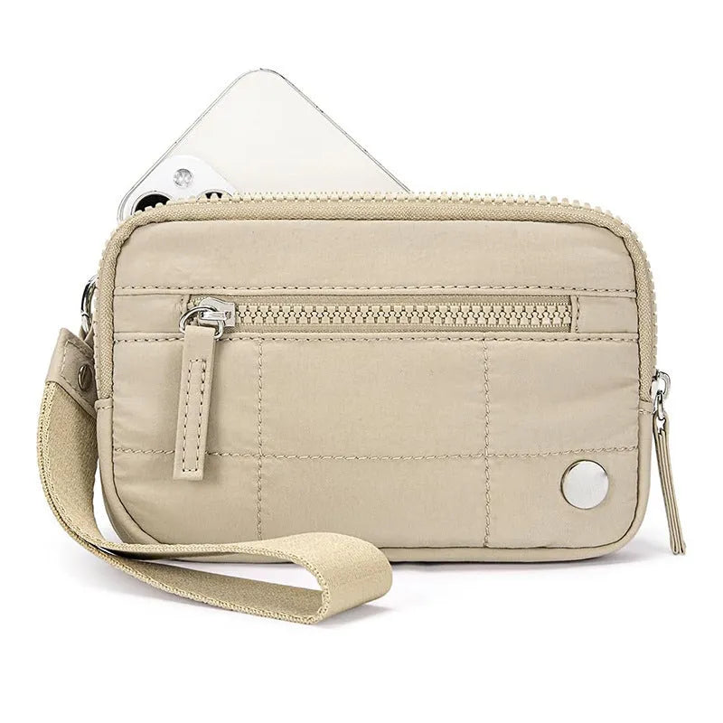 Waterproof quilted women's handbag with transparent deck in beige colour