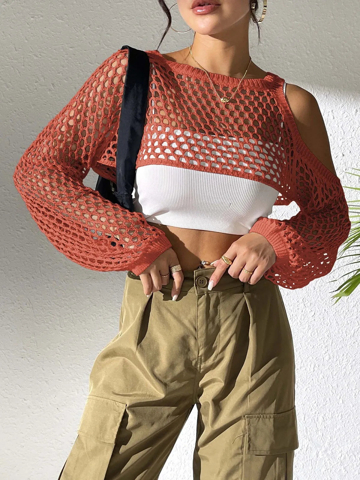 Hollowed navel mesh shirt in polypropylene fibre fabric, shown in a choice of six colours.