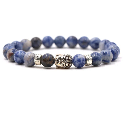 Natural stone stretch bracelet with round beads in various colours including Tigereye and turquoise.